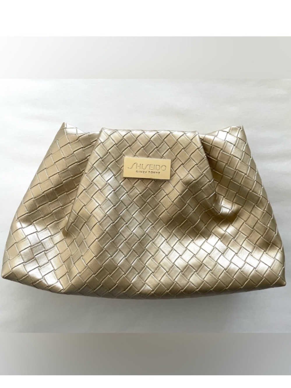 Shiseido gold embossed woven cosmetic clutch pouch bag NWOT